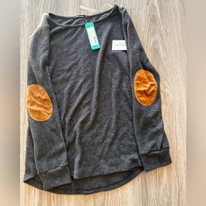 New with tags Pink Clover button back knit top